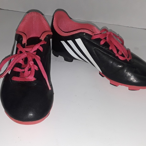 black and pink soccer cleats